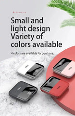 Small power bank electronic devices with a variety of colors on a textured surface.